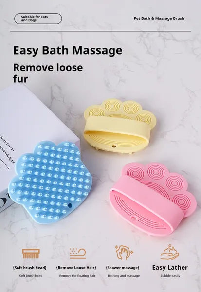 Silicone paw bath brush in blue, yellow and pink